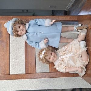 2 Shirley Temple porcelain Dolls